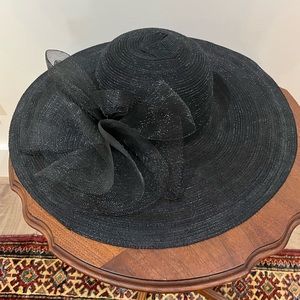 Women's fancy dress hat. Shear with decorative on side.